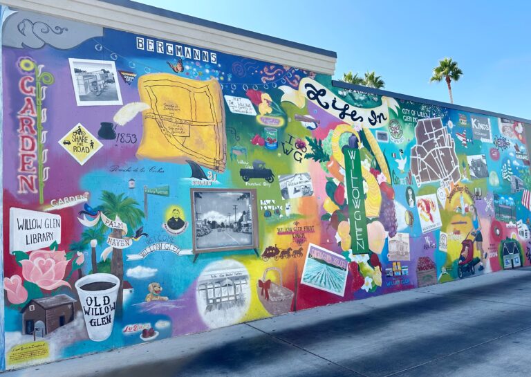 A colorful mural featuring the many landmarks of the Willow Glen neighborhood.